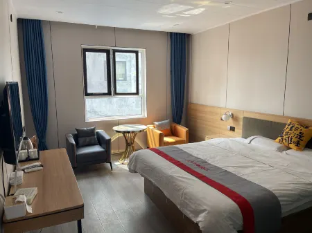 Junyi Chain Hotel (Yangxin Xingfu 2nd Road) Отели рядом с достопримечательностью «Yangxin Shuiluopo Folk Culture Tourism Area»