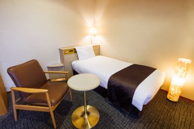 洋室シングル（バス付）（禁煙） 亀の井ホテル 潮来の写真