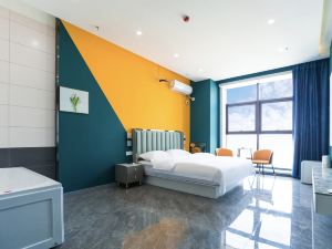 Bubbles Hotel Apartment (Jinfeng Yushui International Branch)