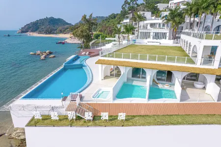 Xingshu Villa Hotel (Huidong Xunliaowan Scenic Area Store) Отели рядом с достопримечательностью «Jinyintan Beach»