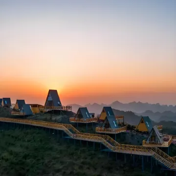 Milan • Serenity Haven Design Hotel (Nandan Bus Terminal Jin Furong Plaza) Отели в г. Наньдань