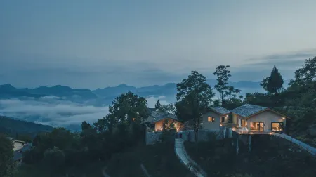 Yinju Xiangli Huapopo Homestay Отели в г. Цзыян