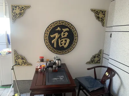 Flower Inn Sevens Mansion Отели рядом с достопримечательностью «Xinzhou Ancient City - South Gate Tower»