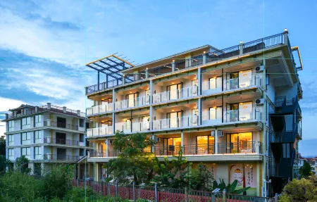 Banna Manor (Xishuangbanna Jinghong Mengxi Big Buddha Temple Store Отели рядом с достопримечательностью «Xishuangbanna Folk Custom Garden»