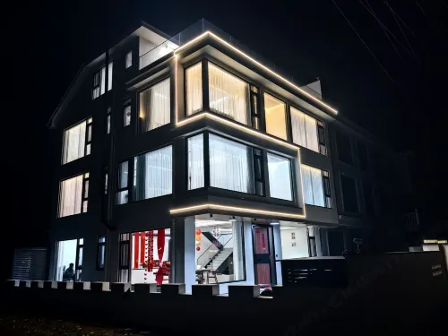 Yaoshan Xu · Natural Qixin | Minimalist Modern Qingning Boutique Stay - Beach