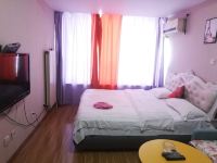 青岛自由空间度假公寓 - 温馨家庭一室大床房