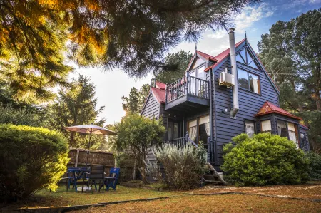 Bells Estate Great Ocean Road Cottages Отели в г. Энглсея