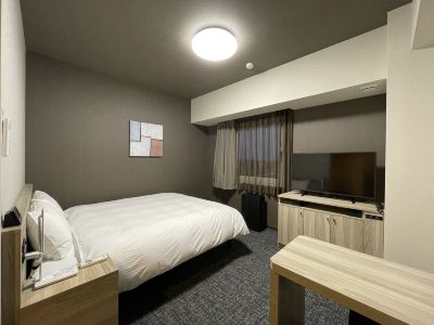 スタンダードダブル禁煙 ホテルルートイン見附 -中之島見附インター-の写真