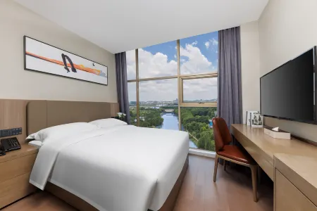 Amigo Hotel (Shenzhen Gongming Honghuashan Subway Station&Honghuashan Sports Complex) Отели рядом со станцией Guangmingcheng Railway Station