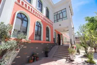 Balote Garden Homestay（Liuxing street store ,Yining City) Hotéis em 