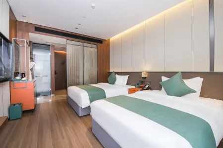 Hangzhou Fuyang Ruiqi Hotel (Fuchun New World Shop) Отели рядом с достопримечательностью «Hangzhou Polytechnic (Gaoke Road)»