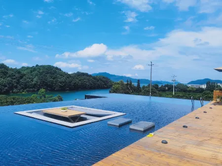 Xinxili Homestay Отели рядом с достопримечательностью «Lushan Xihai Scenic Area»