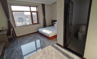 Wafangdian Xinyue Business Hotel