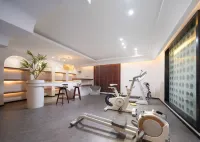 โรงแรมรีสอร์ทหลัวอินวันเดอร์แลนด์ ทะเลสาบหลัวกู่ - ที่มีฟิตเนส