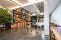 No.52 Creative Workshop Hotel (Zhengzhou Xinzheng International Airport) - bar