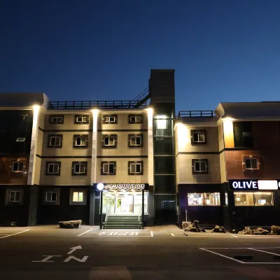 Suanbo Hot Spring Healing Hotel Отели рядом с достопримечательностью «Храм Токчуса»