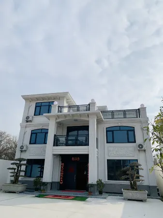 Sunshine Xincheng Homestay Отели рядом с достопримечательностью «Mulan Grassland»