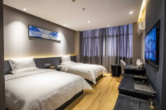 Wanhong Business Hotel (Qinyang Bus Station Branch)