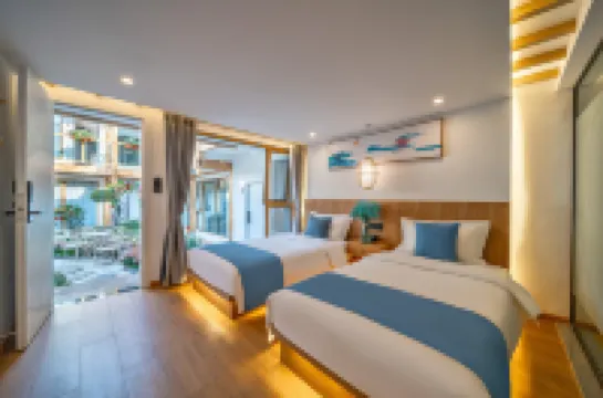 Huashijian Inn (Lijiang Ancient City Mufu Branch)