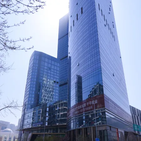 Dalian Baixuan Hotel Apartment (Xinghai Square)