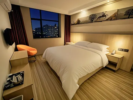 Weisu Hotel (Xinfeng Railway Station) Отели рядом с достопримечательностью «Chenyi Square»