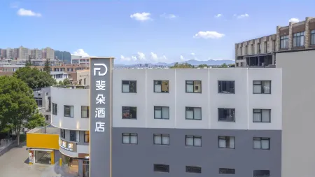 Feiduo FTOURHOTEL (Kunming Economical Development Zone Kunchuan Industrial Park) Отели рядом с достопримечательностью «Kunming University»