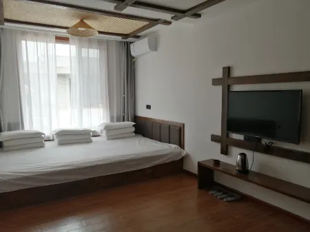 Yichuan Shaanbei Qing B&B Hotel Отели в г. Ичуань