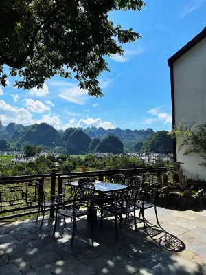 Xingyi Yinfeng Inn Отели в г. Синъи