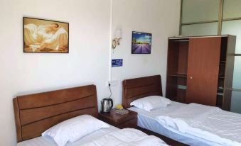 Xuwen Jiaoweixiang Nanyuan Homestay