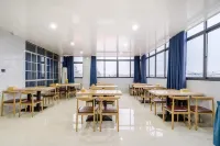 Junyi Hotel (Huaibin Mobile Building Store) - فطور