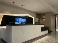 Xinyoulian Business Hotel