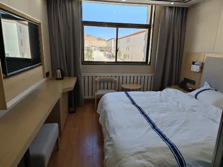 Ritu Xinsheng Hotel Отели в г. Риту