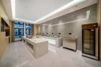 Muxi Hotel (Lanxi Baolong Plaza Store)