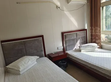 Yongning Xingsheng business Hotel Отели рядом с достопримечательностью «Yongning Hequan Lake Tourist Area»