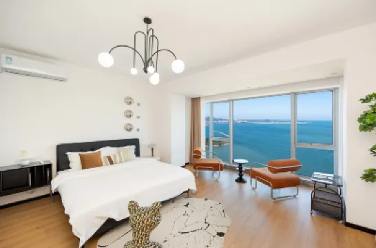 Yantai Haige Cloud House Designer Hostel World Trade Center shop) 世茂広場周辺のホテル