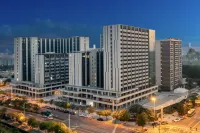 Licheng Platinum Hotel (Medical University Affiliated Hospital of Chinese Medicine Branch) Hotel dekat Luogang Gymnasium