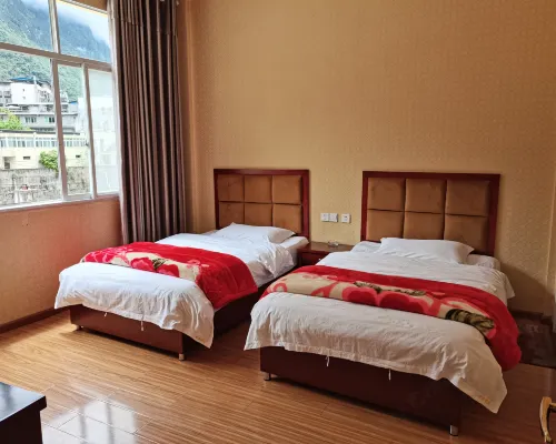 Baoxing Xinyuan Hotel فنادق في باوشينغ