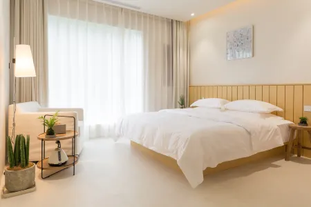 Xinmi Ji You Fang Diverse Homestay Отели рядом с достопримечательностью «Fengquan Lake Scenic Area»