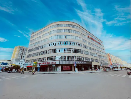 Guangzhou Jiulong Hotel (Xingren Liren Square) Отели в г. Синжэнь