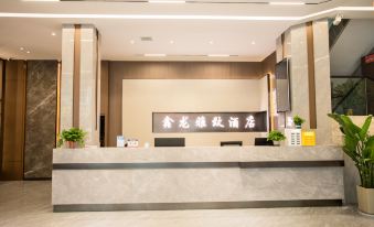 Xinlong Yazhi Hotel (Xinhua West Bus Station)