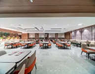 Karamay Xinxing Hotel (Baicheng University Town) Отели в г. Карамай