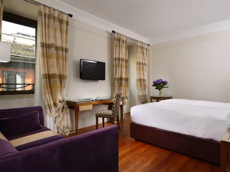 UNA HOTELS Decò Roma Отели рядом с достопримечательностью «Case Romane del Celio»