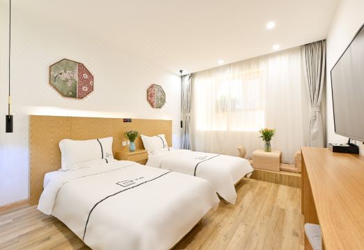 Xingshe Alley 호텔의 정원과 전통적인 인테리어