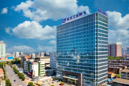 Shanfei Huizhan Center Hotel Отели рядом с достопримечательностью «Hanzhong Gymnasium»