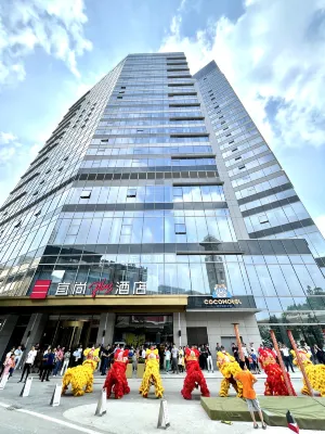 Echarm Plus Hotel (Guangzhou Junming Huanle World) Hotel dekat Guangdong Polytechnic College of Agriculture， Industry and Commerce (East to Qiaojian Lvye Mountain Villa)