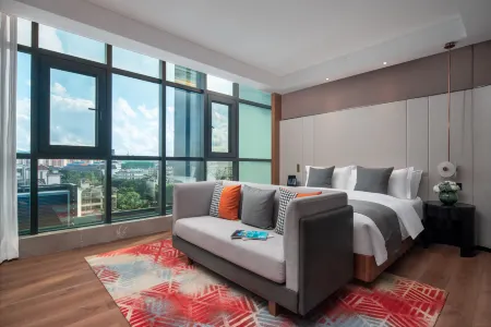 Pu'er Songkun Hotel (Yuecheng Shiguangli Shopping Park Shop)