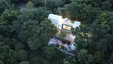 Yuanju Yuanchu Homestay Отели рядом с достопримечательностью «Nanshan Botanical Garden»