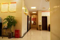 Xuan'en Junhua Business Hotel