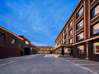 喆啡飯店（赤峰克什克騰旗烏蘭布統景區店） 甘丹駝城遊牧文化景區附近的飯店
