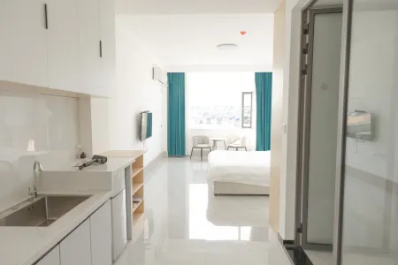 Junan County Shiguang Apartment Отели в г. Цзюйнань